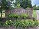 Neighborhood welcome sign in a brick structure: 'Foxfire at Lake Spivey' at 8440 Winston Way, Jonesboro, GA 30236