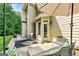 Cozy outdoor patio with comfortable seating and a view of the backyard at 1605 Cascade Overlook, Peachtree City, GA 30269