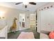 Well-appointed Bedroom featuring a cute giraffe decor, plush rug, and access to the ensuite bathroom at 1605 Cascade Overlook, Peachtree City, GA 30269