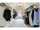 Large walk-in closet with carpet and custom shelving for lots of storage at 1605 Cascade Overlook, Peachtree City, GA 30269