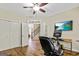 Spacious exercise room offering ceiling fan, double door closets, and view to stairs at 1605 Cascade Overlook, Peachtree City, GA 30269