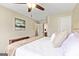 Bright main bedroom featuring stylish decor, plush bedding, and access to the ensuite bath at 1605 Cascade Overlook, Peachtree City, GA 30269