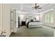 Spacious bedroom features a trey ceiling, neutral walls, and lots of natural light at 1605 Cascade Overlook, Peachtree City, GA 30269