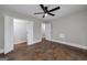 Bedroom with hardwood floors, a closet and a ceiling fan at 858 Pates Creek Rd, Stockbridge, GA 30281