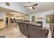 Bright living room open to the kitchen featuring a fireplace, LVP flooring, and high ceilings at 107 Trisha Ln, Grantville, GA 30220