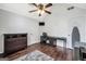 Bedroom with a ceiling fan, a gray rug, and hardwood floors at 250 Stallsworth Rd, Mcdonough, GA 30252