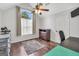 Charming bedroom with a vaulted ceiling, hardwood floors, and large window for natural light at 250 Stallsworth Rd, Mcdonough, GA 30252
