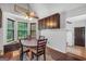 Charming dining area with natural light, a ceiling fan, and built-in bench seating at 250 Stallsworth Rd, Mcdonough, GA 30252