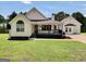 Charming single-story home with well-manicured lawn, covered porch, and welcoming curb appeal at 250 Stallsworth Rd, Mcdonough, GA 30252