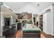 Efficient kitchen space boasting stainless appliances, granite countertops and hardwood flooring at 250 Stallsworth Rd, Mcdonough, GA 30252