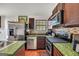 Well-equipped kitchen with stainless steel appliances, a tile backsplash, and ample counter space at 250 Stallsworth Rd, Mcdonough, GA 30252