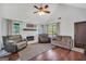 Inviting living room showcasing a vaulted ceiling, fireplace, and comfortable seating area at 250 Stallsworth Rd, Mcdonough, GA 30252