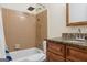 Bathroom featuring a tub and shower combo with a granite vanity and faucet at 5436 Ahyoka Dr, Morrow, GA 30260