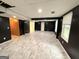 Spacious basement featuring modern flooring, recessed lighting, and neutral walls at 2325 Lochinver Sw Ln, Conyers, GA 30094