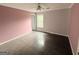 Bedroom featuring fresh paint, trim, and a ceiling fan at 2325 Lochinver Sw Ln, Conyers, GA 30094