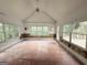 Bright sunroom with multiple windows and access to the outdoors at 2325 Lochinver Sw Ln, Conyers, GA 30094