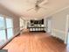 Open-concept living area with connecting kitchen at 2325 Lochinver Sw Ln, Conyers, GA 30094