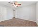 Bedroom featuring carpet flooring and a modern ceiling fan with lighting at 2565 Aaron Ct, Loganville, GA 30052
