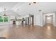 Open floor plan features a modern kitchen and a spacious living area with vaulted ceilings at 2565 Aaron Ct, Loganville, GA 30052