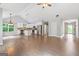 Spacious open-plan area with hardwood floors, a modern kitchen, and ample natural light at 2565 Aaron Ct, Loganville, GA 30052