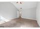 Expansive main bedroom featuring plush carpeting, neutral walls, and a high, vaulted ceiling at 2565 Aaron Ct, Loganville, GA 30052