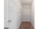 Well-organized walk-in closet with shelving and ample storage space for clothes and accessories at 2565 Aaron Ct, Loganville, GA 30052