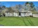 Charming single-story home with a well-manicured lawn and inviting front entrance at 4385 Midway Rd, Douglasville, GA 30134