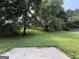 Tree covered backyard with plenty of shade at 5156 Allison Way, Sugar Hill, GA 30518