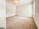 Neutral bedroom featuring fresh paint, new carpet and a ceiling fan at 5156 Allison Way, Sugar Hill, GA 30518