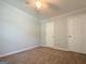 Neutral bedroom featuring carpet, white walls, and ceiling fan at 5156 Allison Way, Sugar Hill, GA 30518