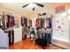 Walk-in closet with custom shelving, ample storage, and natural light at 543 Wynn Rd, Mcdonough, GA 30252