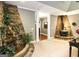 Unique living area featuring a stone waterfall and a cozy fireplace at 543 Wynn Rd, Mcdonough, GA 30252