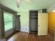Spacious bedroom featuring a large closet and hardwood flooring at 402 Stone St, Oxford, GA 30054