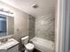 Bathroom featuring a new vanity, and updated shower and tub surround at 2500 Brentwood Rd, Decatur, GA 30032