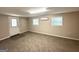 Bonus Room, carpeted, with two windows and exterior door at 2500 Brentwood Rd, Decatur, GA 30032