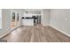 Spacious living area with hardwood floors seamlessly connects to the bright kitchen at 583 Whitaker Nw St, Atlanta, GA 30318