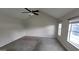 Bedroom with vaulted ceiling, ceiling fan, and multiple windows at 2378 Charleston Se Pt, Atlanta, GA 30316