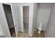 Walk-in closet with shelving and a water closet with a toilet at 2378 Charleston Se Pt, Atlanta, GA 30316