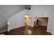 Spacious living room with hardwood floors, tall ceilings, and abundant natural light streaming in from many directions at 2378 Charleston Se Pt, Atlanta, GA 30316