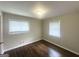 Cozy bedroom with hardwood floors, natural light, and window with blinds at 3153 Bellgreen Way, Decatur, GA 30032