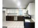 Renovated kitchen with stainless steel appliances, granite countertops, and ample cabinet space at 3153 Bellgreen Way, Decatur, GA 30032