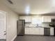 Updated kitchen with stainless steel appliances, granite countertops, and stylish backsplash at 2327 Scotty Cir, Decatur, GA 30032