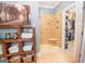 Beautiful bathroom features a walk-in shower with a glass door and storage shelves at 220 Lavender Oasis, Peachtree City, GA 30269
