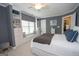 Comfortable bedroom featuring built-in shelving and a window seat for added charm at 220 Lavender Oasis, Peachtree City, GA 30269