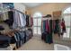 Walk-in closet with built-in shelving and hanging space for organized storage at 220 Lavender Oasis, Peachtree City, GA 30269