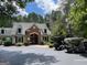 Exterior view of the clubhouse and golf carts parked in the parking lot at 220 Lavender Oasis, Peachtree City, GA 30269