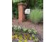 Community entrance sign for The Broadlands is surrounded by white flowers and greenery at 220 Lavender Oasis, Peachtree City, GA 30269