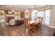 Open concept living with dining area, fireplace, and natural light at 220 Lavender Oasis, Peachtree City, GA 30269