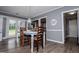 Inviting dining area with views to the backyard and seamless connection to the kitchen at 6391 Katherine St, Douglasville, GA 30134