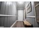 Hallway featuring wood-look floors, neutral walls, and decorative accents at 6391 Katherine St, Douglasville, GA 30134